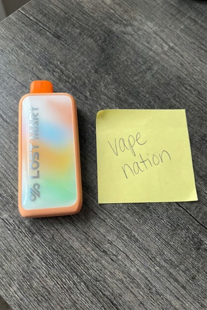 Customer photo of a Lost Mary next to a Puff Company note